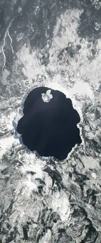 The letter O seen from orbit at Crater Lake, Oregon